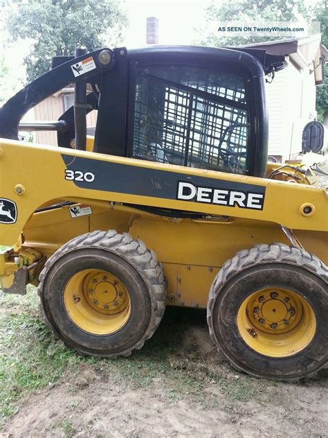 320 john deere skid steer specs|john deere 320 value.